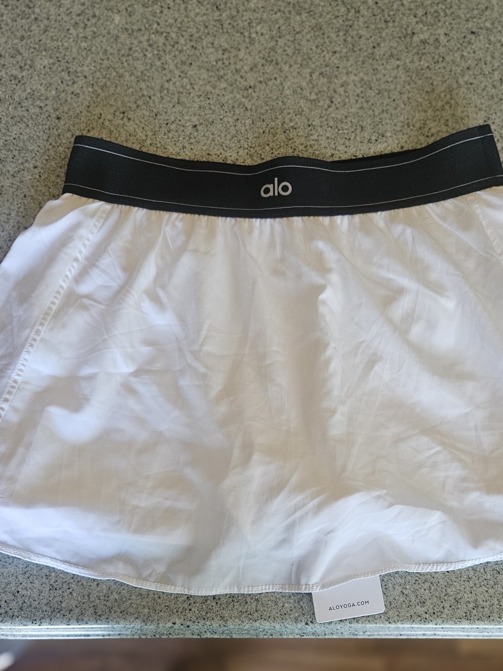 ALO Yoga White Athletic Skort with Black Logo Waistband